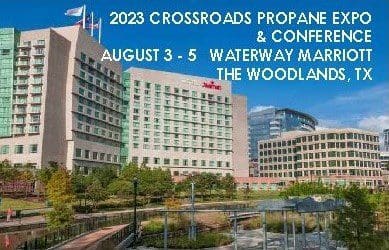 A banner with buildings and written 2023 crossroads